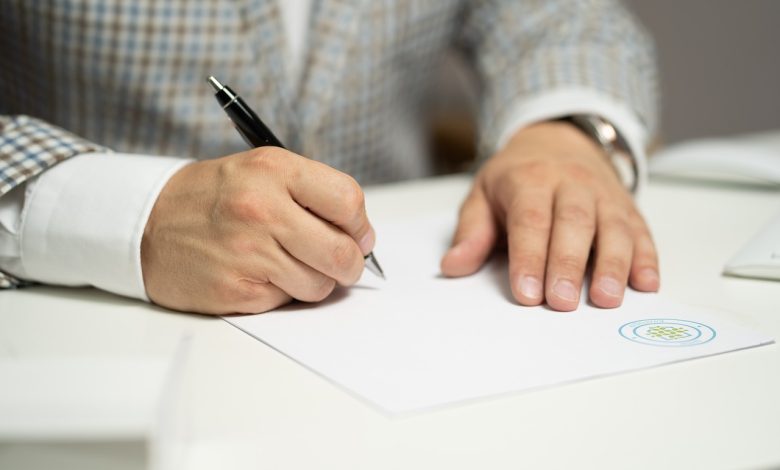 man, sign, paper