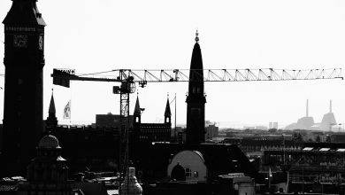 a black and white photo of a clock tower