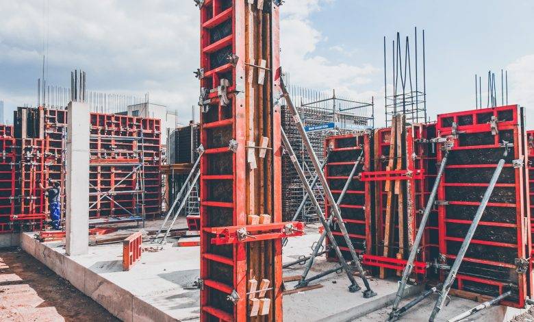 red metal structure with beam