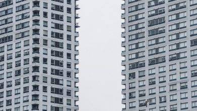 a tall skyscraper and a window